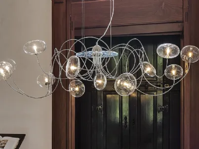 Lampada a sospensione con bracci cromati e paralumi in cristallo Oktopus di Cattelan Italia